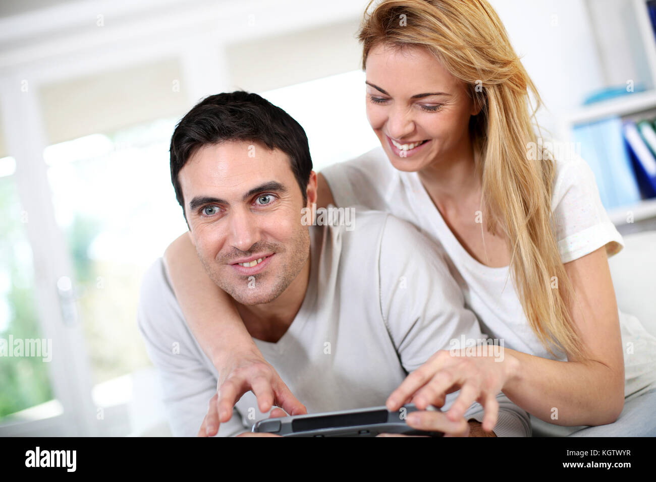 Cute couple playing video games hi-res stock photography and images - Alamy