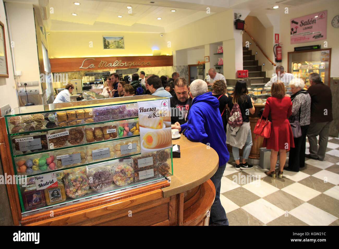 Customers inside baker confectionery shop, La Mallorquina, Calle Mayor