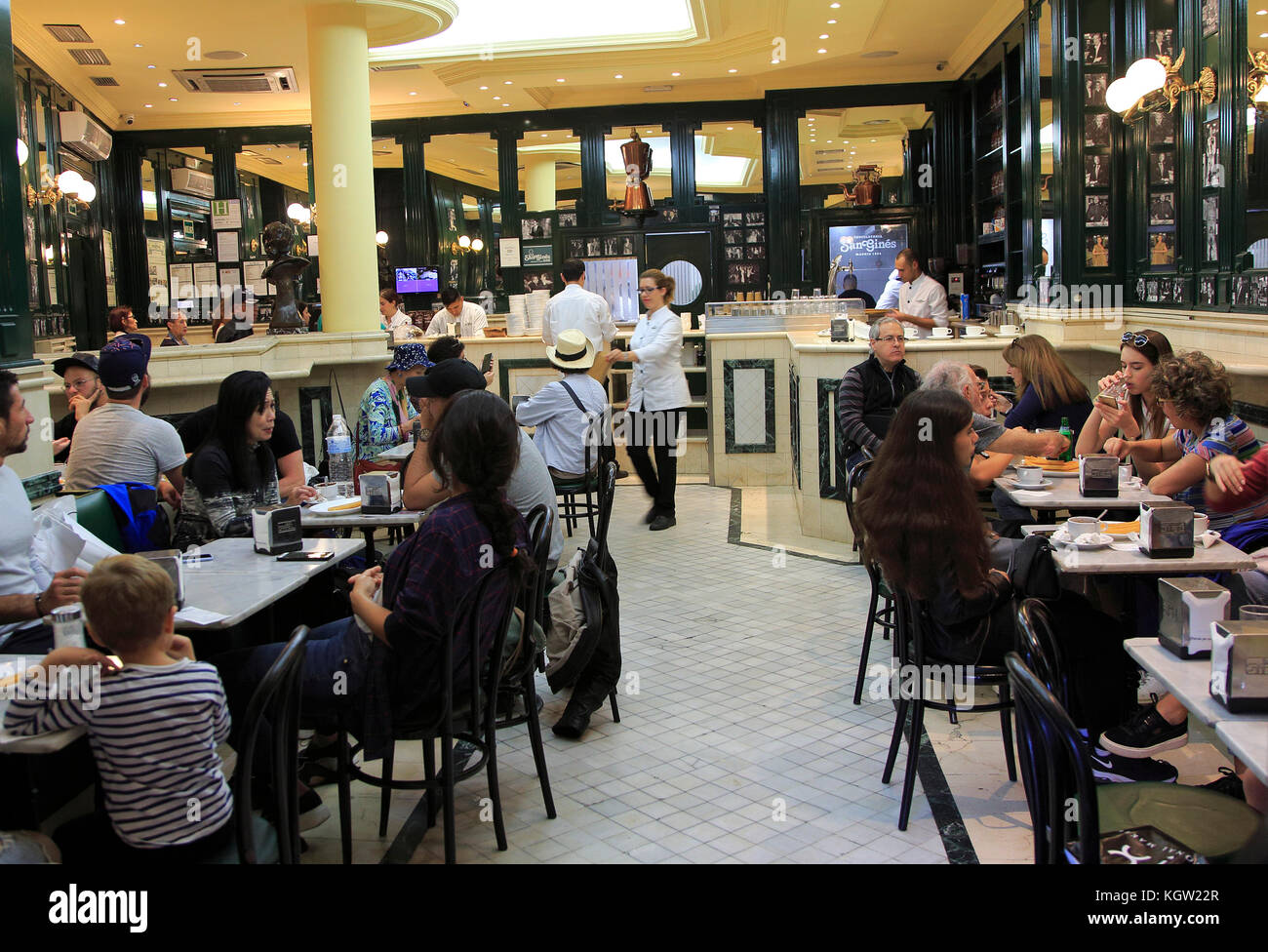 Chocolateria San Gines famous chocolate drink and churros cafe, Madrid city centre, Spain opened 1894 Stock Photo