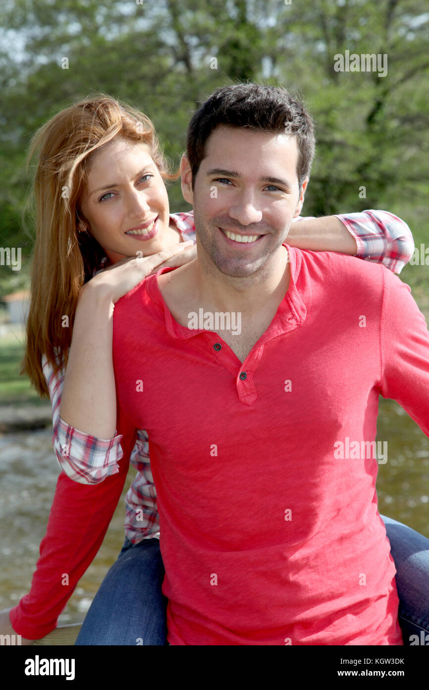 Man carrying his girlfriend hi-res stock photography and images - Alamy