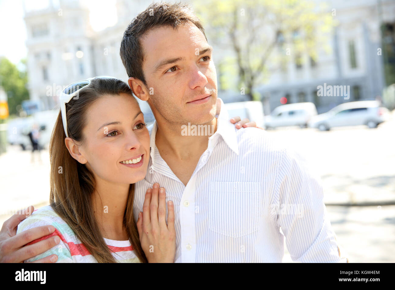 Sweet couple walking in city avenue Stock Photo Alamy