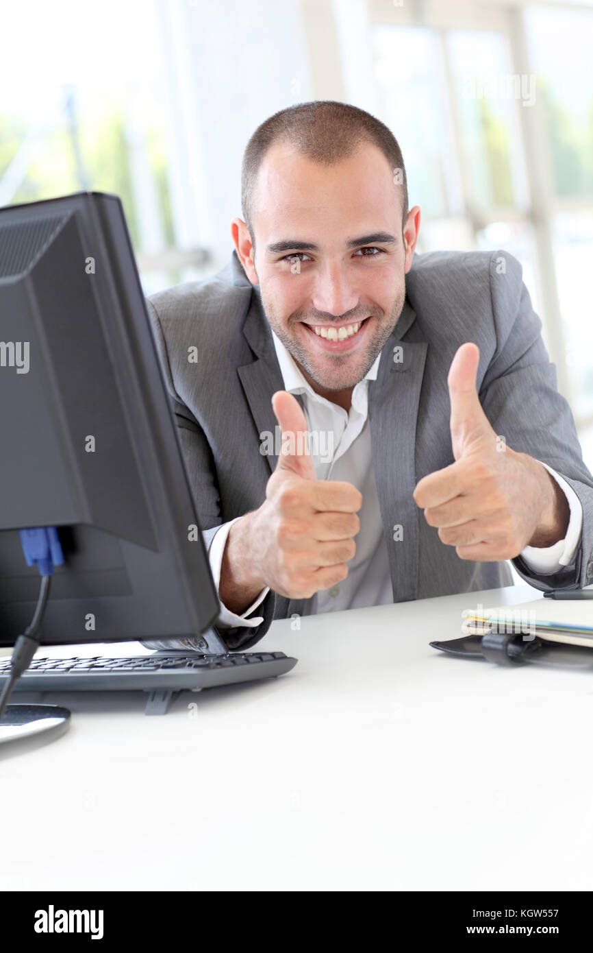 Happy Businessman Showing Thumbs Up Stock Photo Alamy