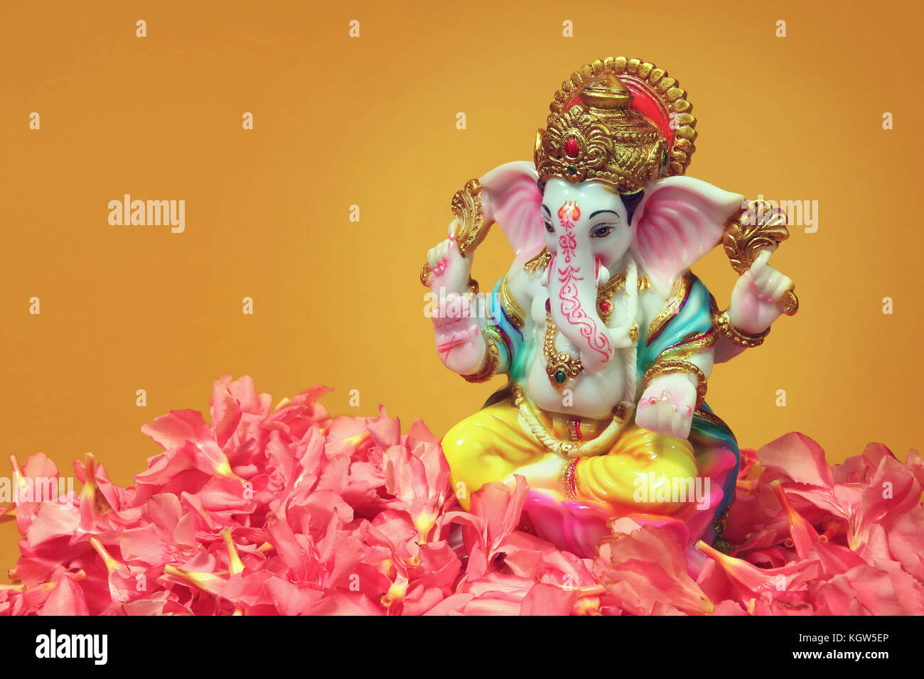 Hindu God Ganesha with oleander flowers Stock Photo - Alamy