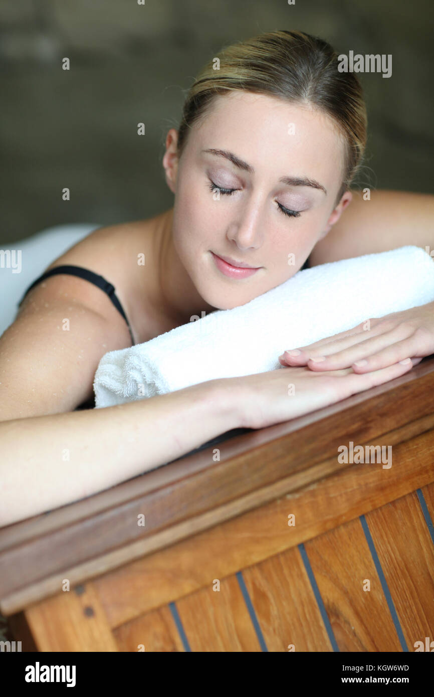 Young woman relaxing in massage table Stock Photo Alamy