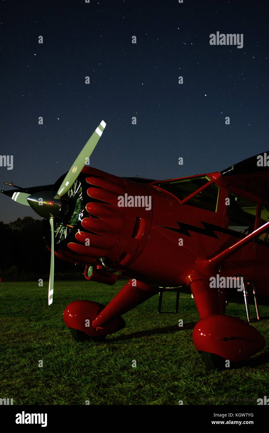 A highly customized Stinson V77 "Gullwing" at rest under the stars at