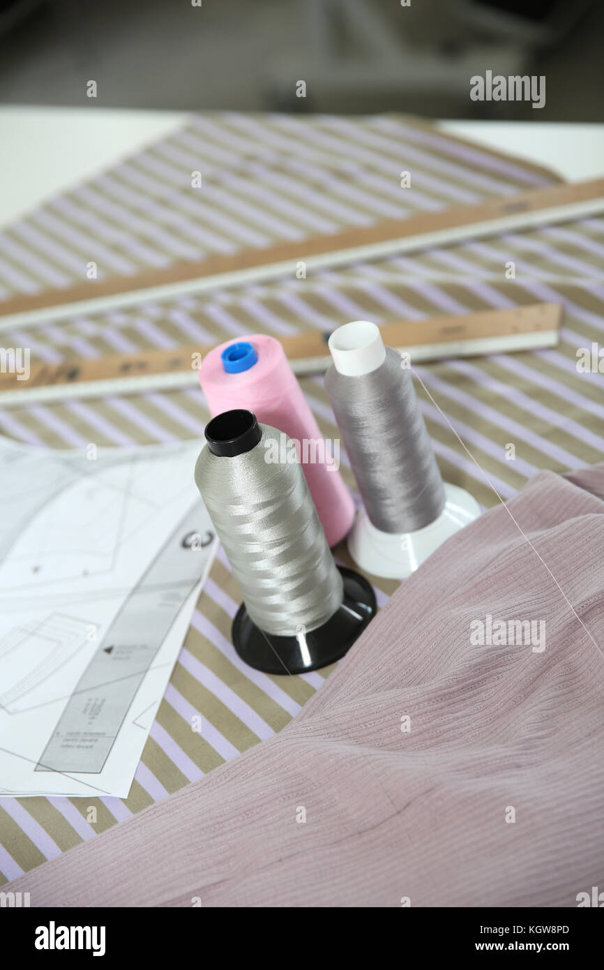 Closeup of dressmaking tools set on table Stock Photo