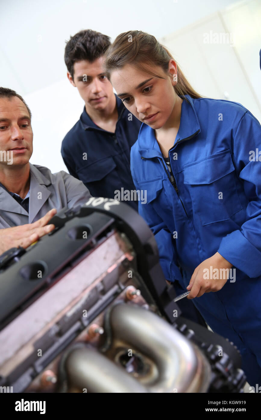 Mechanics training class with teacher and students Stock Photo - Alamy