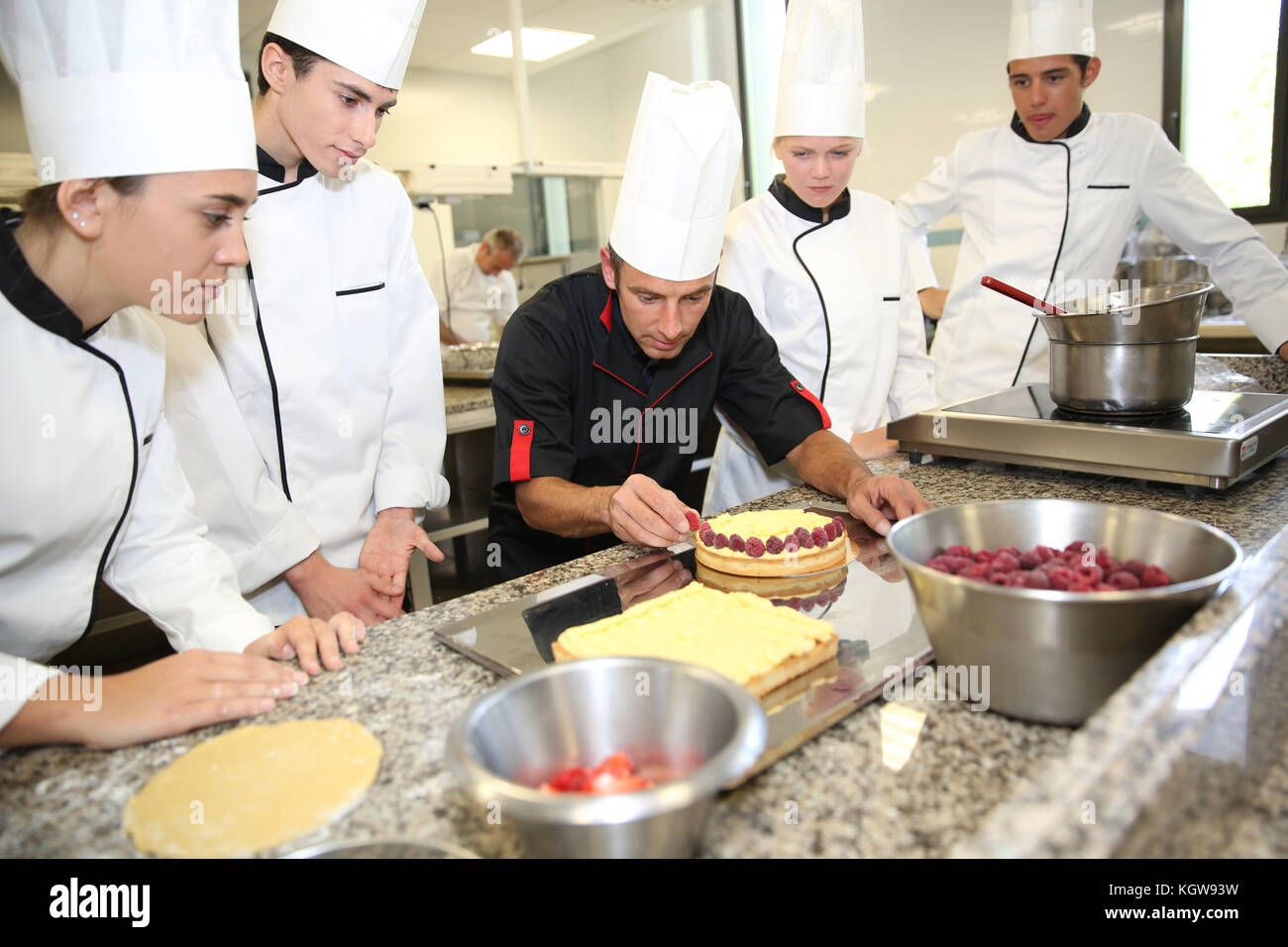 Students with teacher in pastry training course Stock Photo Alamy