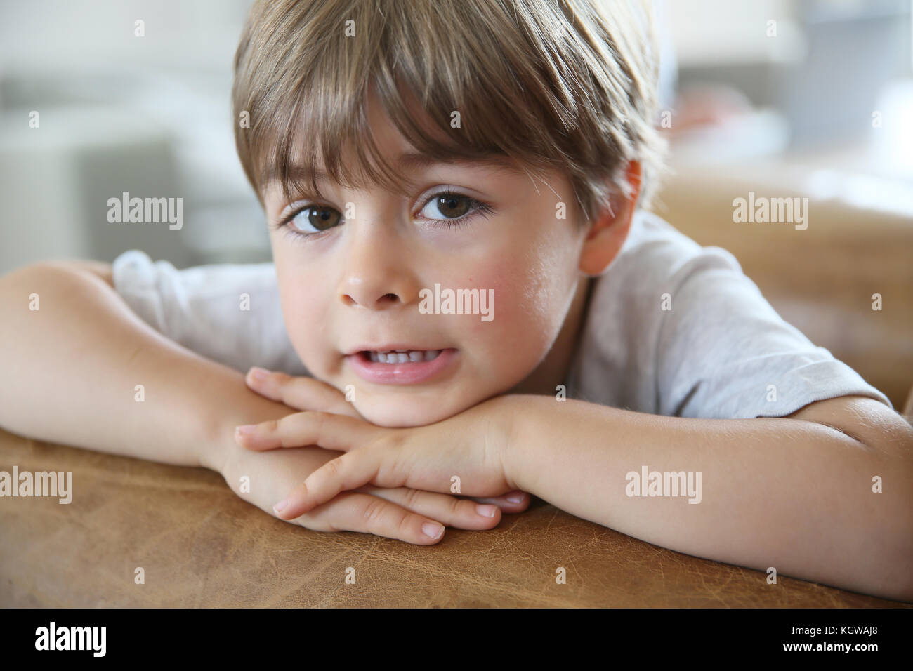 Portrait of cute little boy looking at camera Stock Photo - Alamy