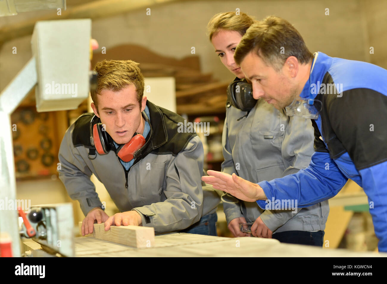 Group of students in woodwork training course Stock Photo - Alamy