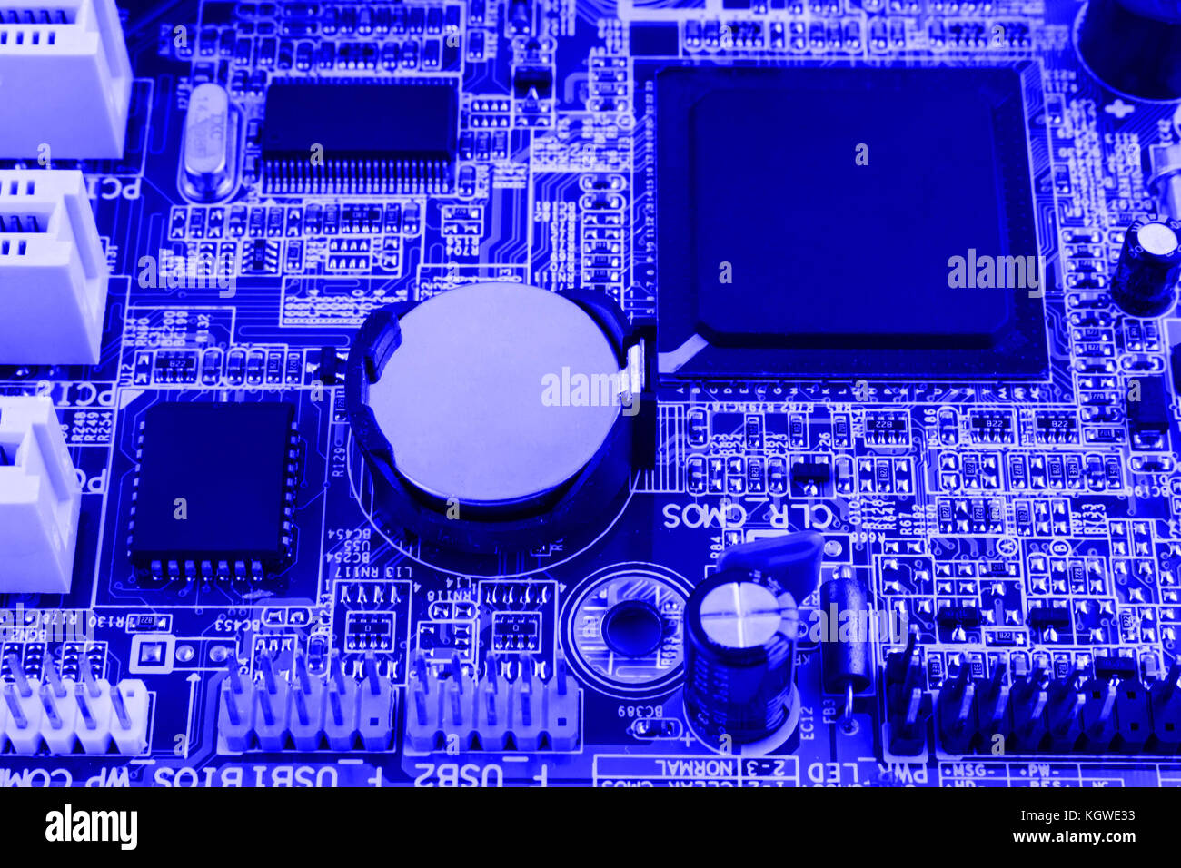 Resistors, capacitors and other electronic components of micro chip inside the computer close up