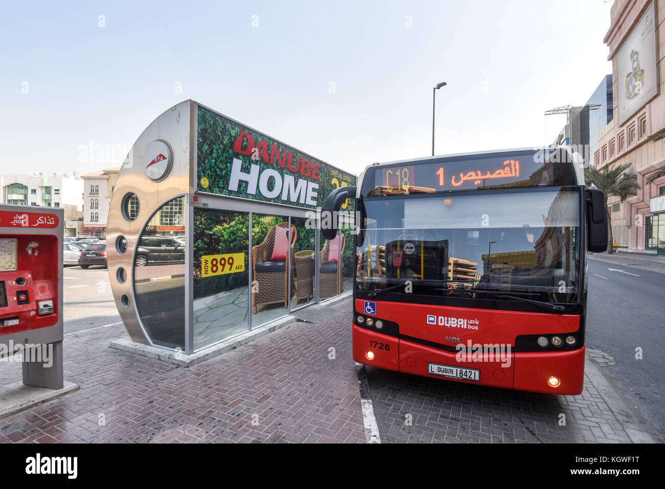 DUBAI, UAE - 30OCT2017: Dubai Bus outside Lamcy Plaza. Because of the extreme climate, many bus shelters are air-conditioned, Stock Photo