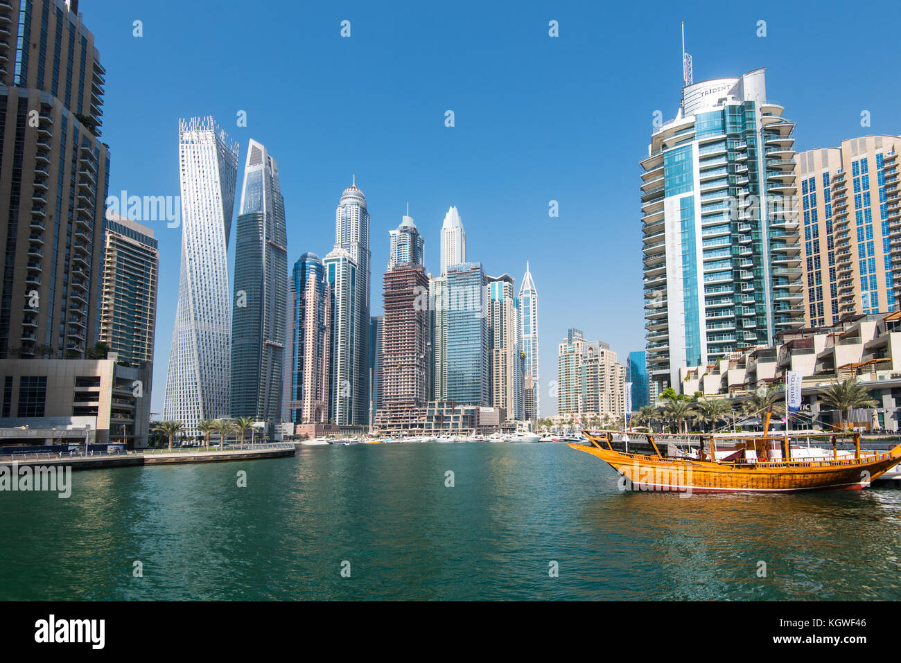 DUBAI, UAE - 31OCT2017: Iconic towers in Dubai Marina including (l-r) Cayan, Damac Heights, Marriott, Emirates Crown, Princess Tower, Torch, Elite Res Stock Photo
