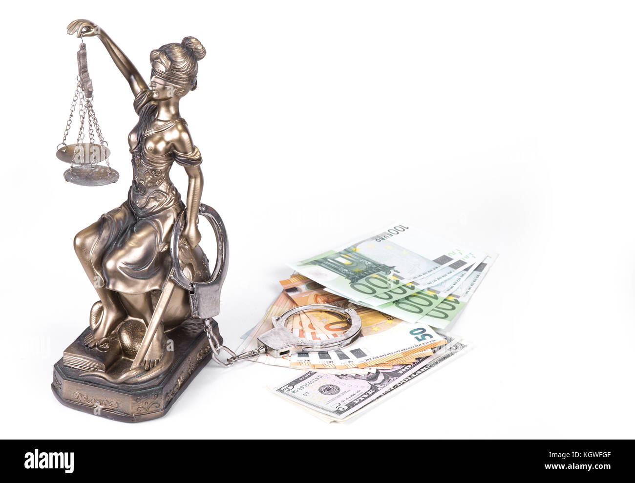 Statue of Justice Themis with money euros and dollars. Bribe and crime concept Stock Photo