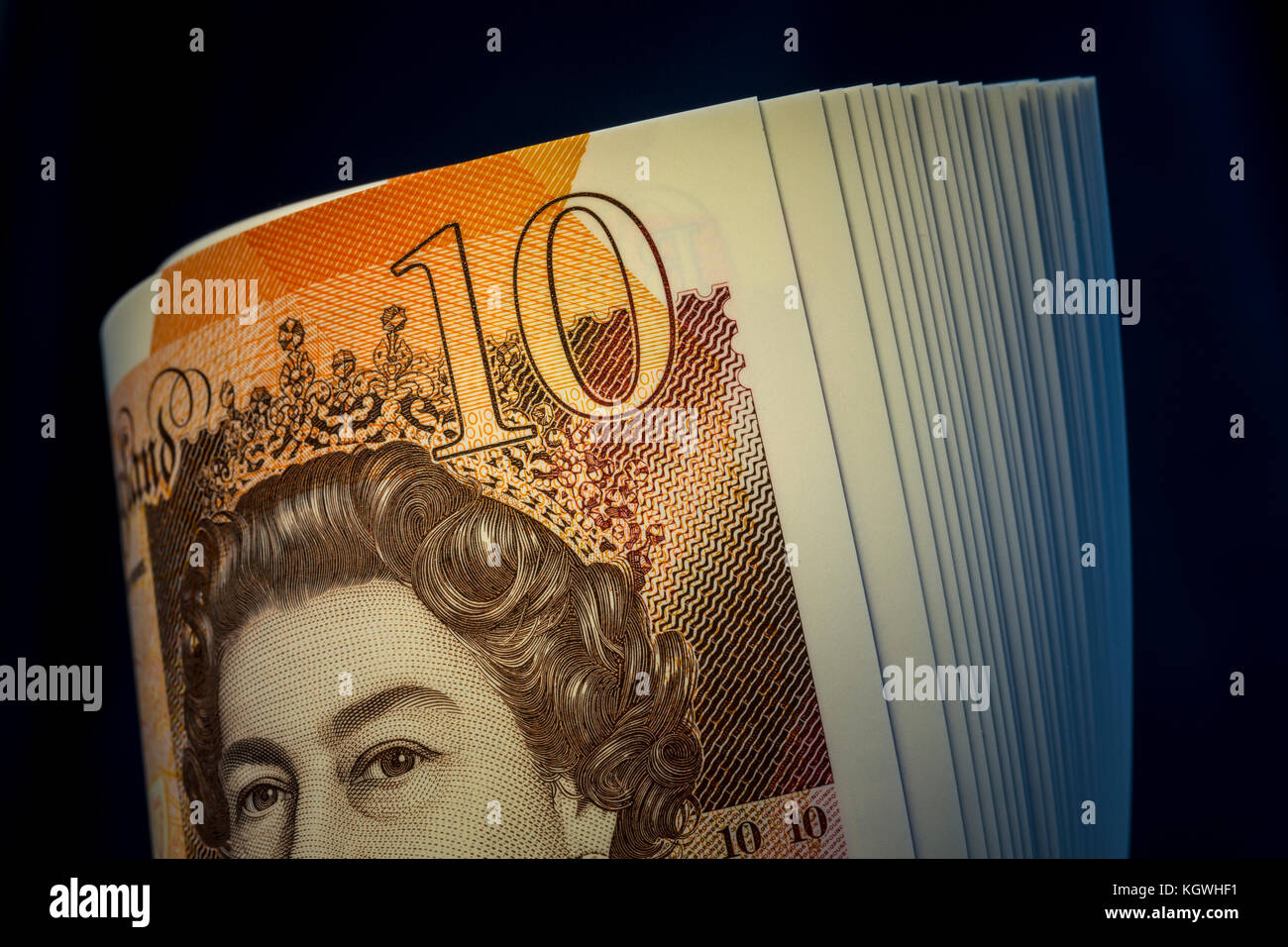 Roll of the new Ten Pound notes. Stock Photo