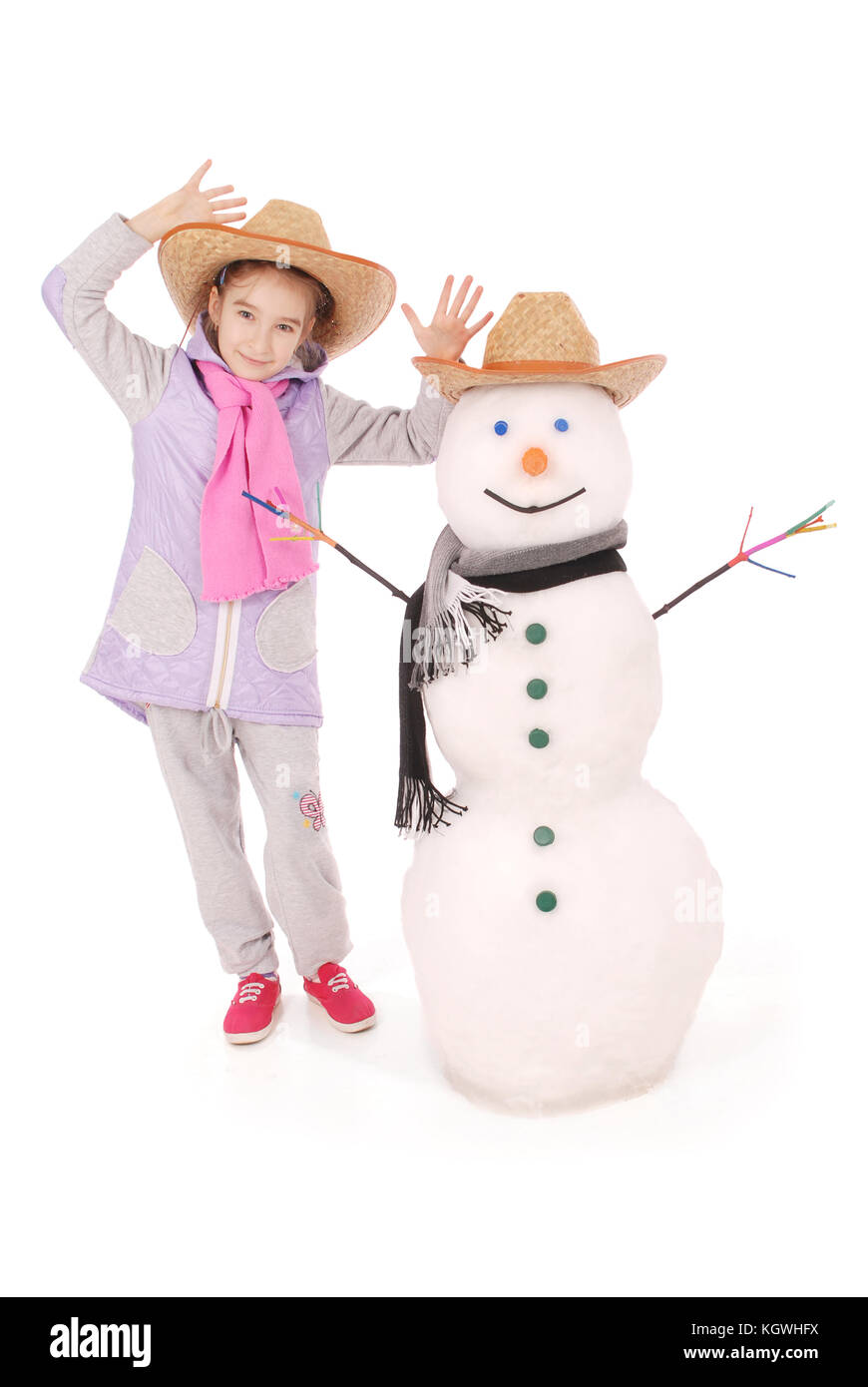 Cute girl with snowman with scarf and hat on white background Stock ...