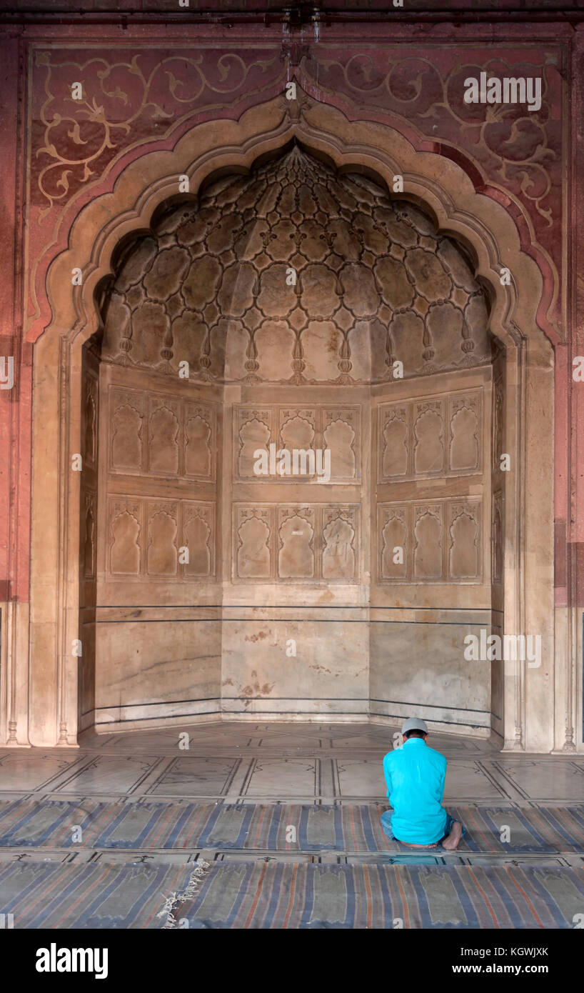 Man Praying In A Mosque Stock Photo