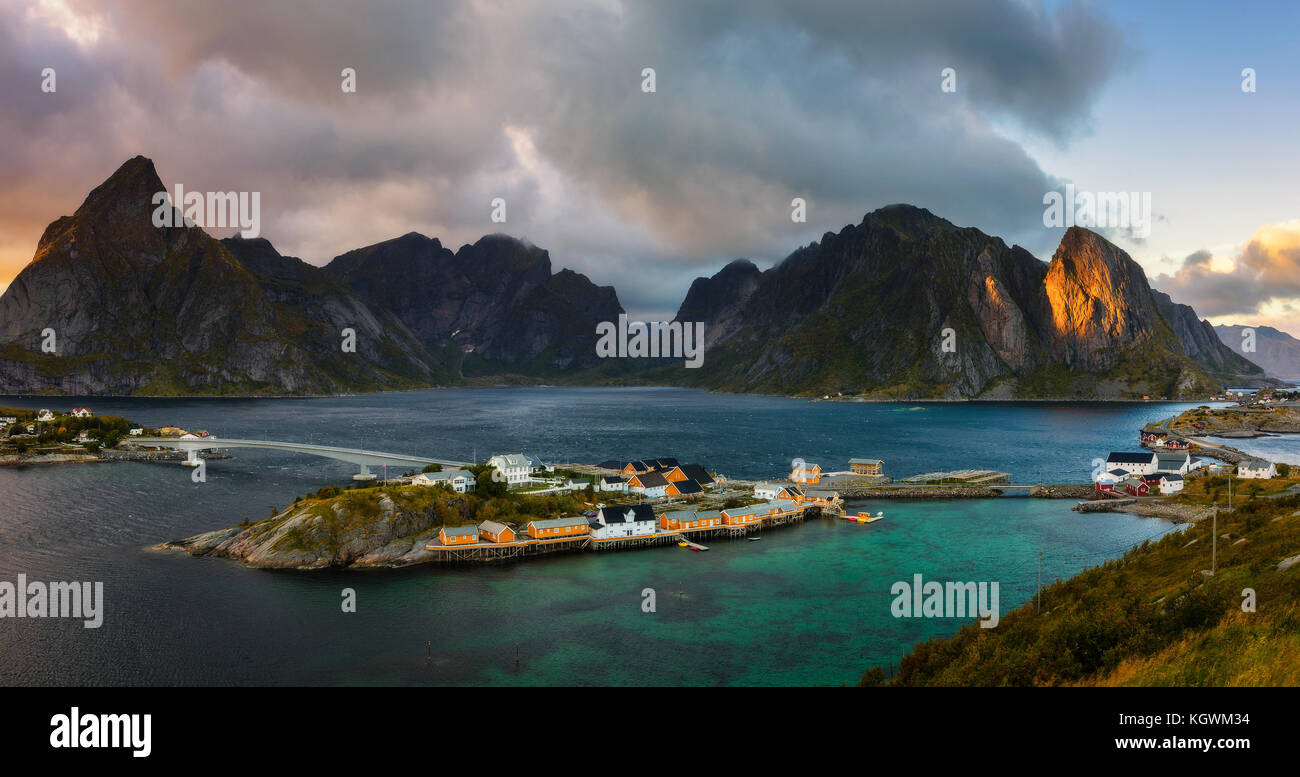 Mount Olstind above the Sakrisoy fishing village, Lofoten, Norway Stock Photo