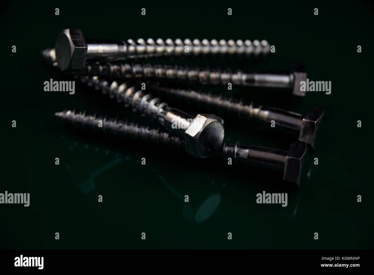 spanner with hexagon head bolt on a dark background Stock Photo Alamy