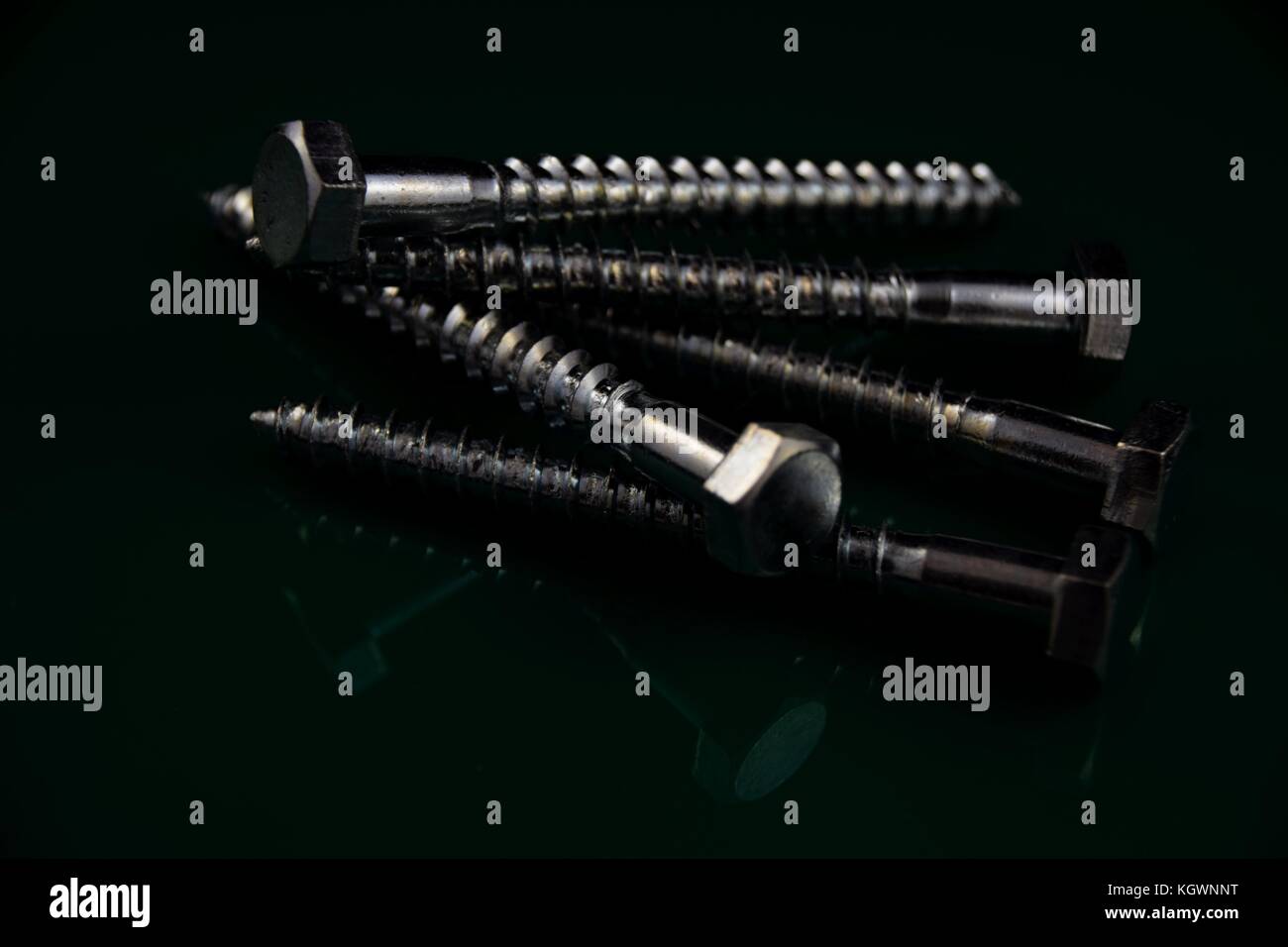 spanner with hexagon head bolt on a dark background Stock Photo Alamy