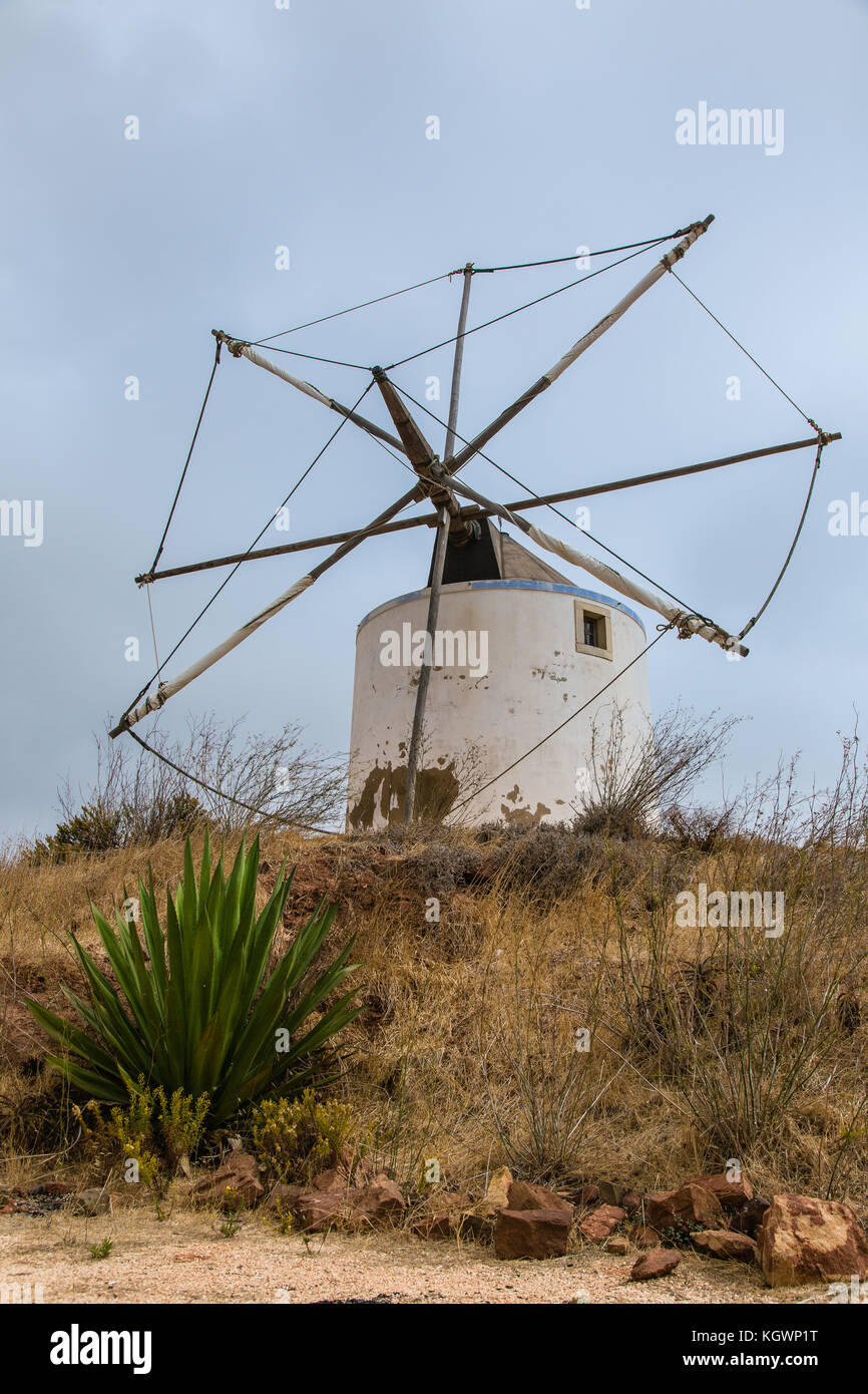 An old style windmill Moinho de Vento in a rural area in Algarve