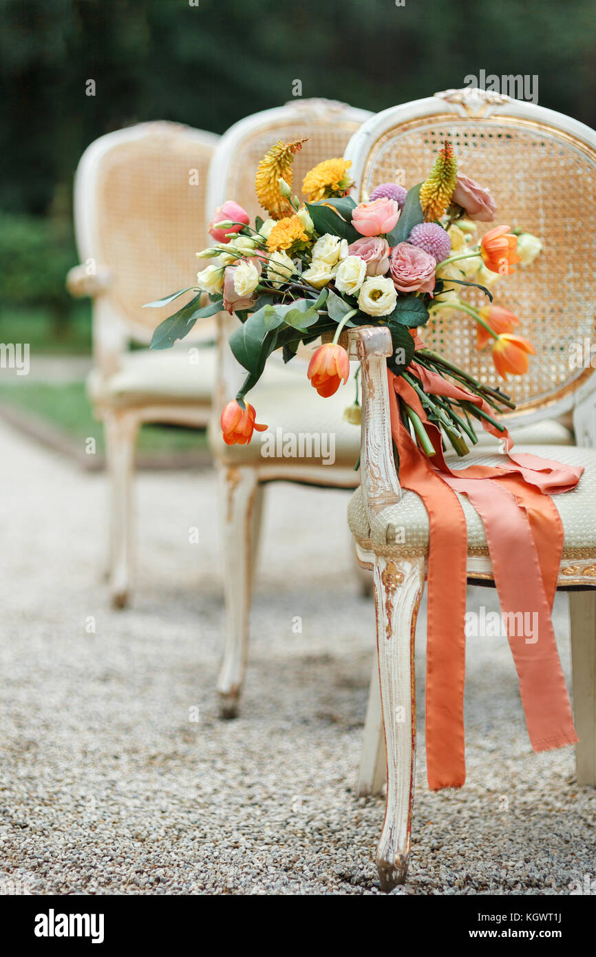 wedding bouquet at chair Stock Photo Alamy
