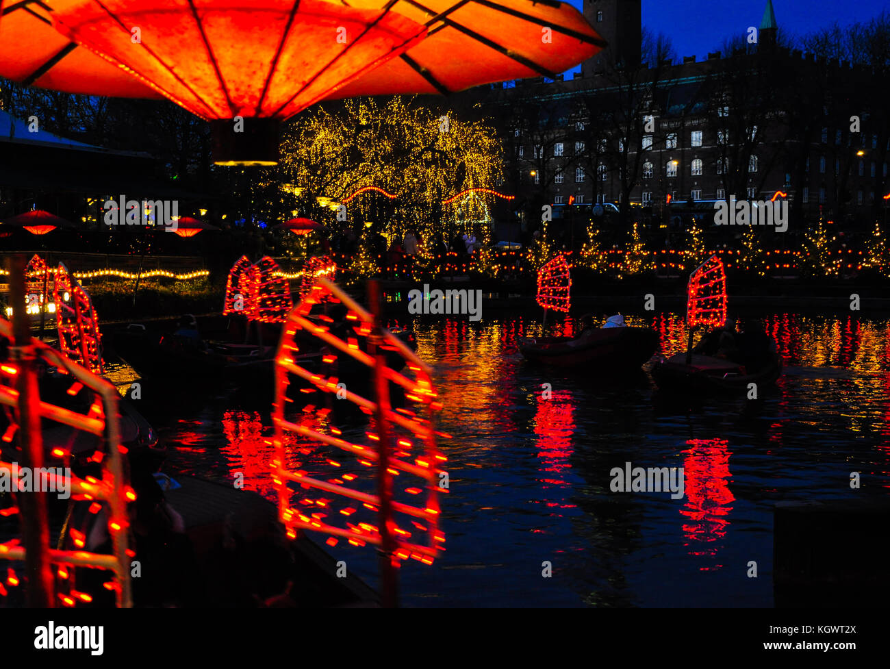 Pedal boats illuminated with red lights at Christmas Stock Photo