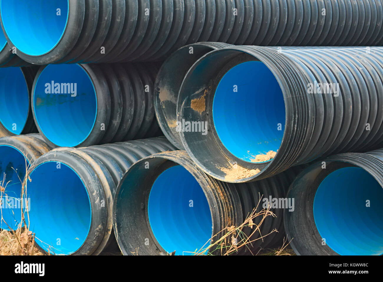 Pipes of PVC large diameter prepared for laying on construction site