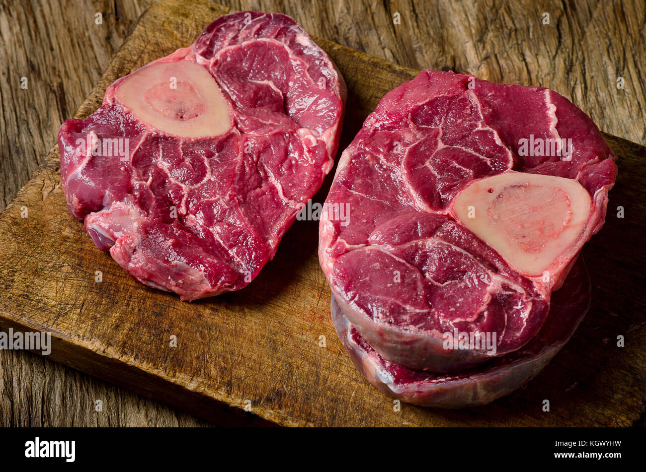 Raw Beef Meat Cross Cut For Ossobuco Cut On A Board Over Rustic Wooden Background Stock Photo Alamy