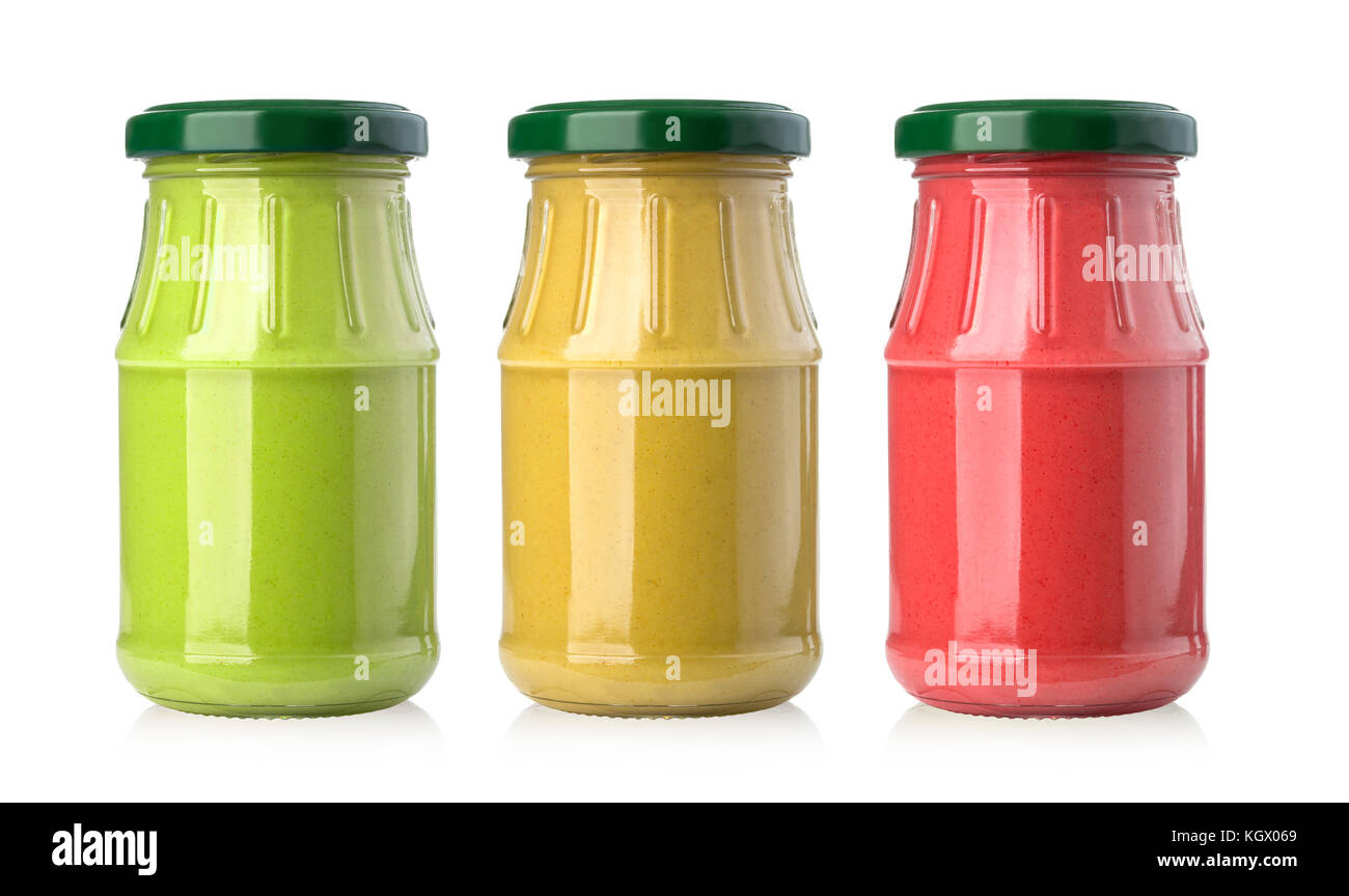 set of sauces in glass jars isolated on white background with clipping