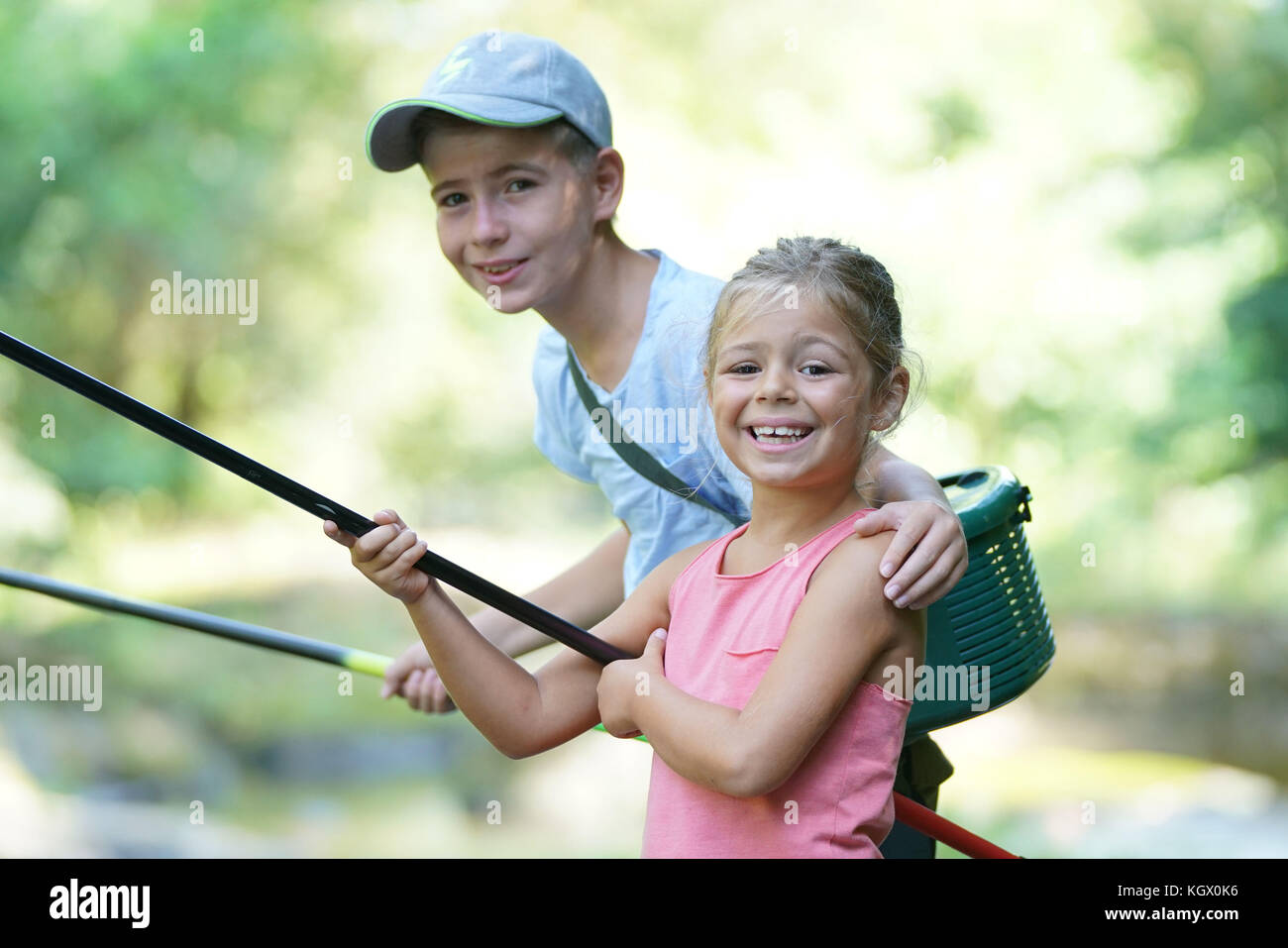 Kids fishing hi-res stock photography and images - Alamy