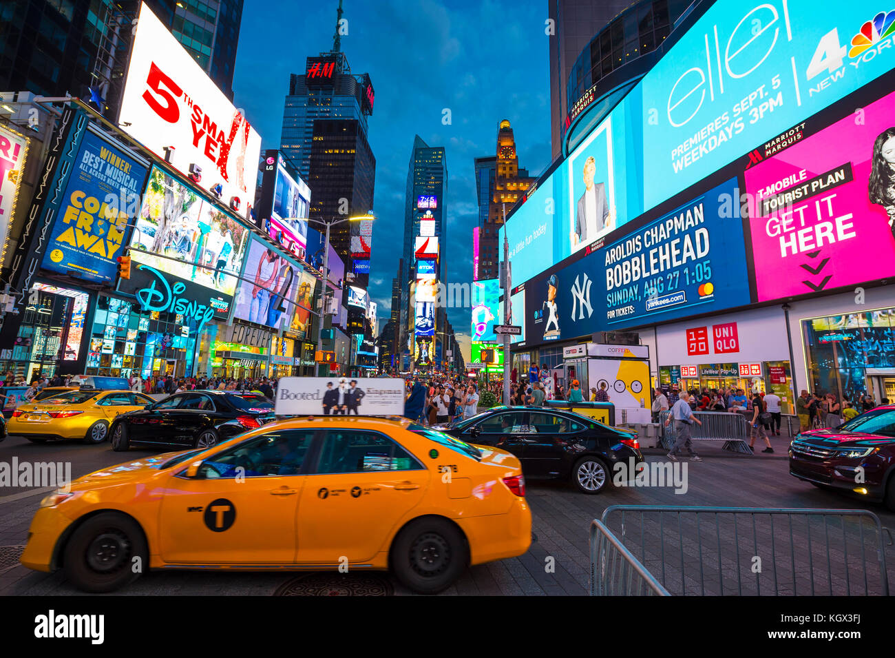 NEW YORK CITY AUGUST 23, 2017 Bright signage flashes over holiday