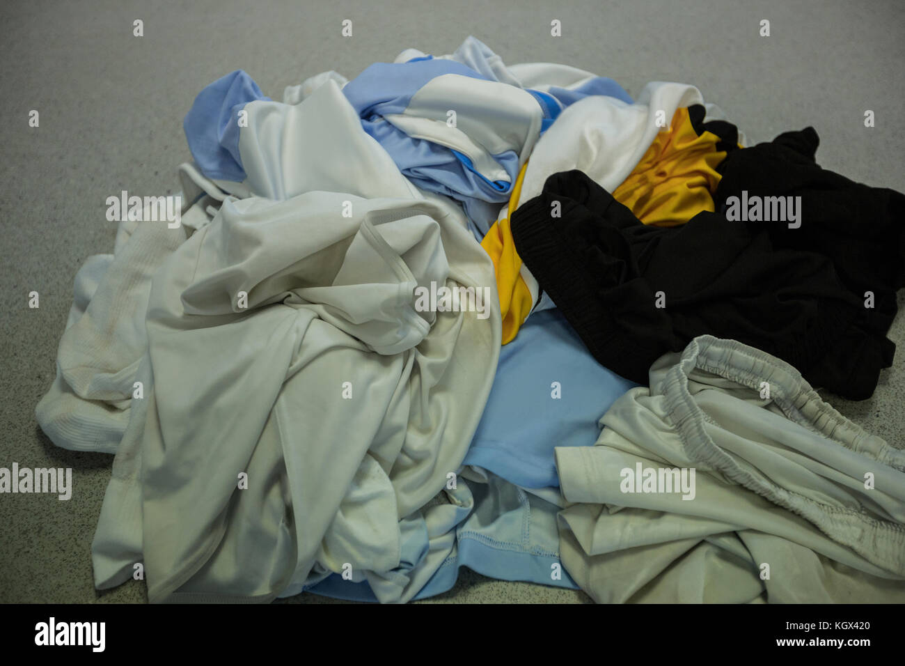 Dirty football jersey on floor in changing room Stock Photo Alamy
