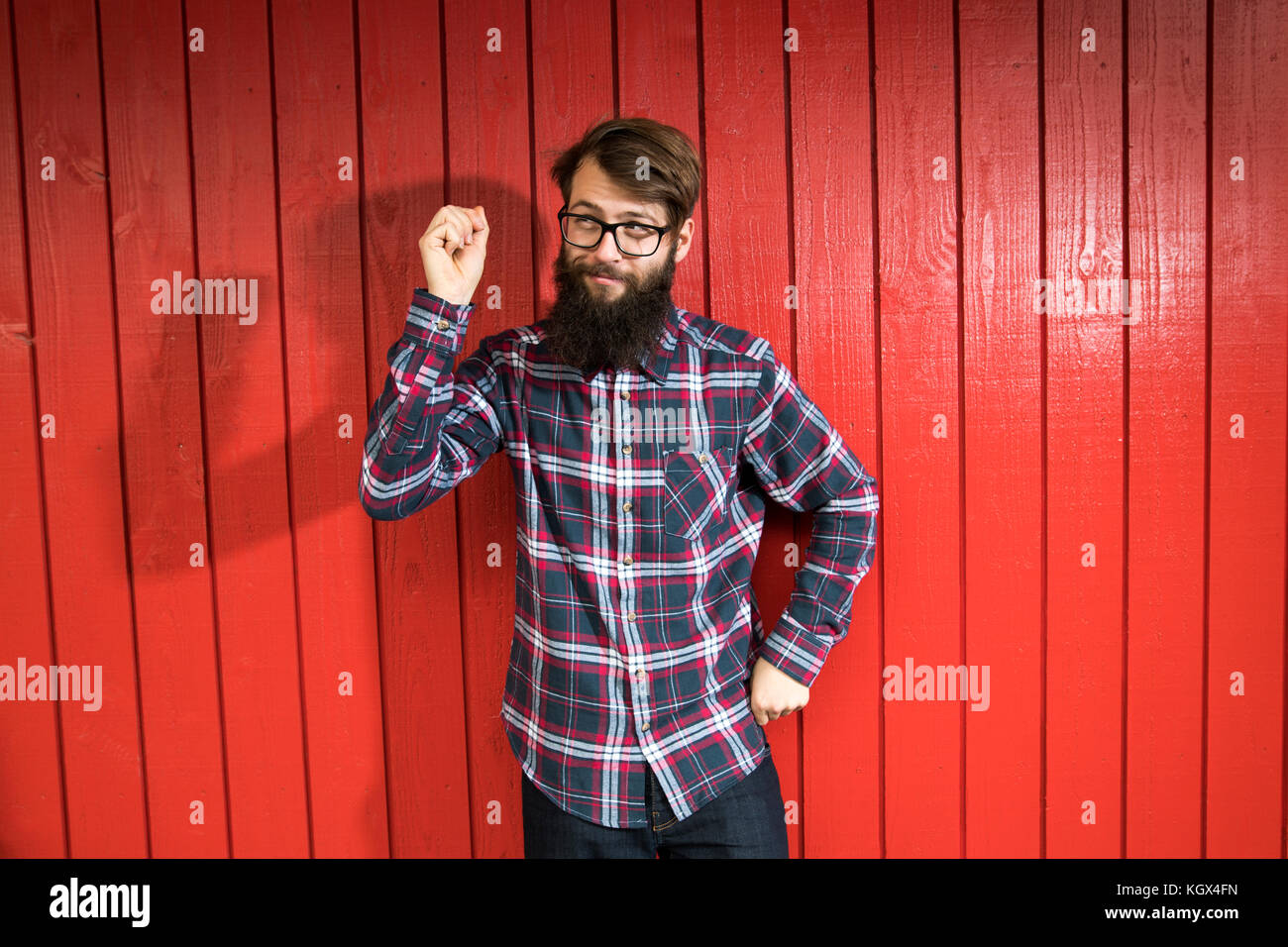 hipster man with beard red background Stock Photo