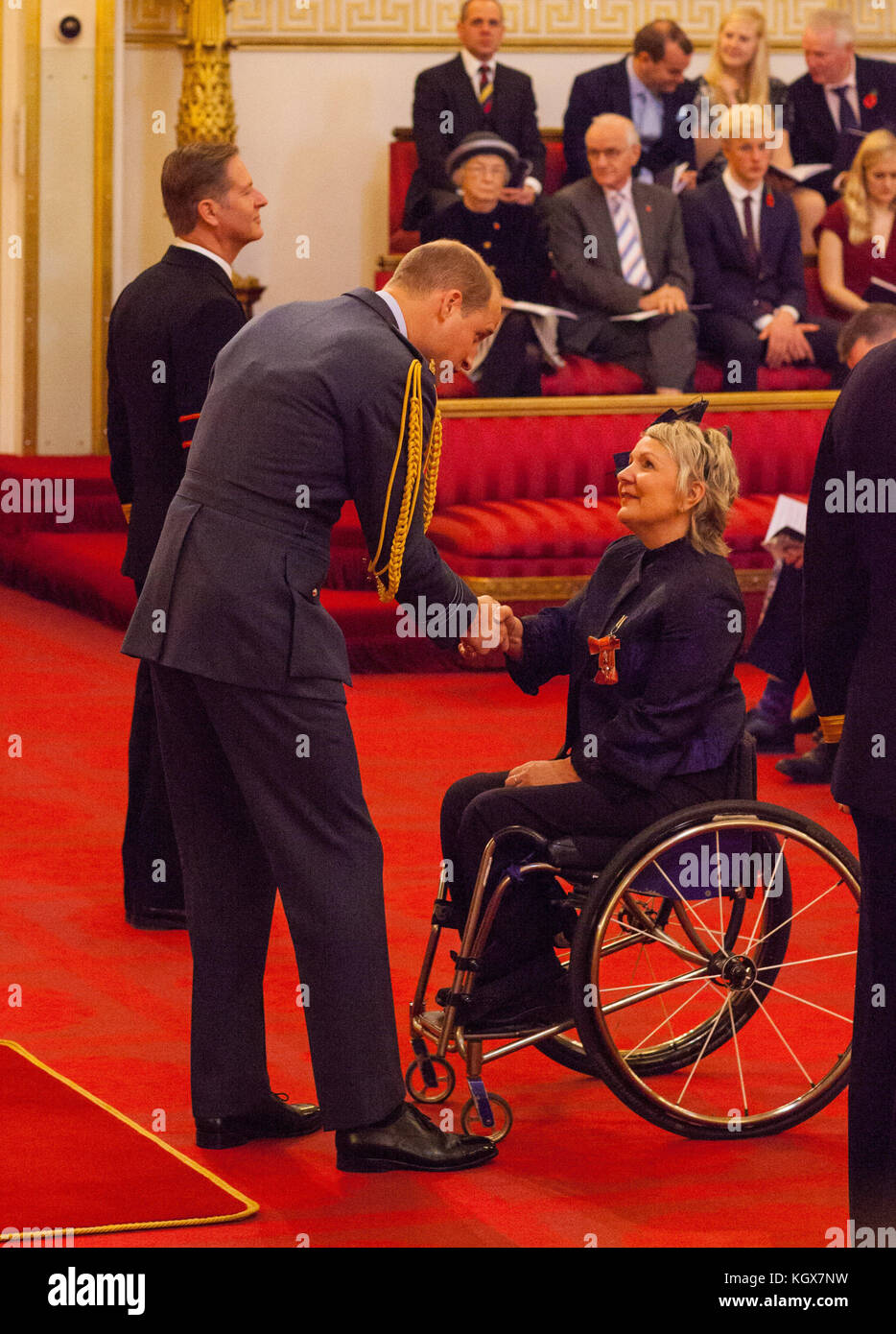 Angela Malone from Glasgow is made an MBE (Member of the Order of the British Empire) by the Duke of Cambridge at Buckingham Palace. Stock Photo