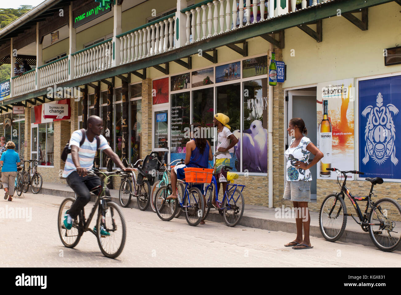 The Seychelles, La Digue, La Passe, village centre, shops travel agency and bank bureau de change Stock Photo