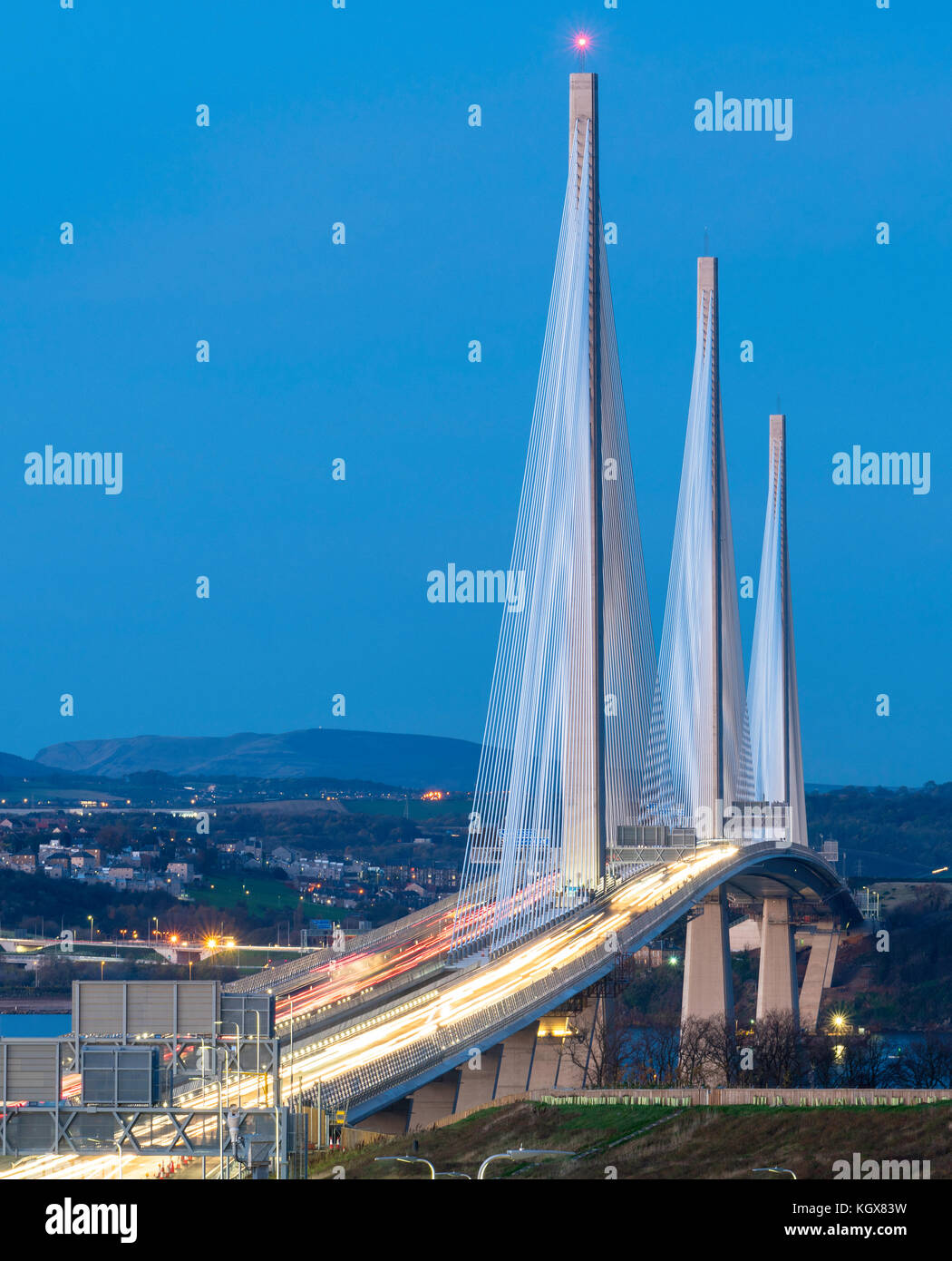 Night view of new Queensferry Crossing Bridge spanning the Firth of Forth in Scotland, United Kingdom Stock Photo