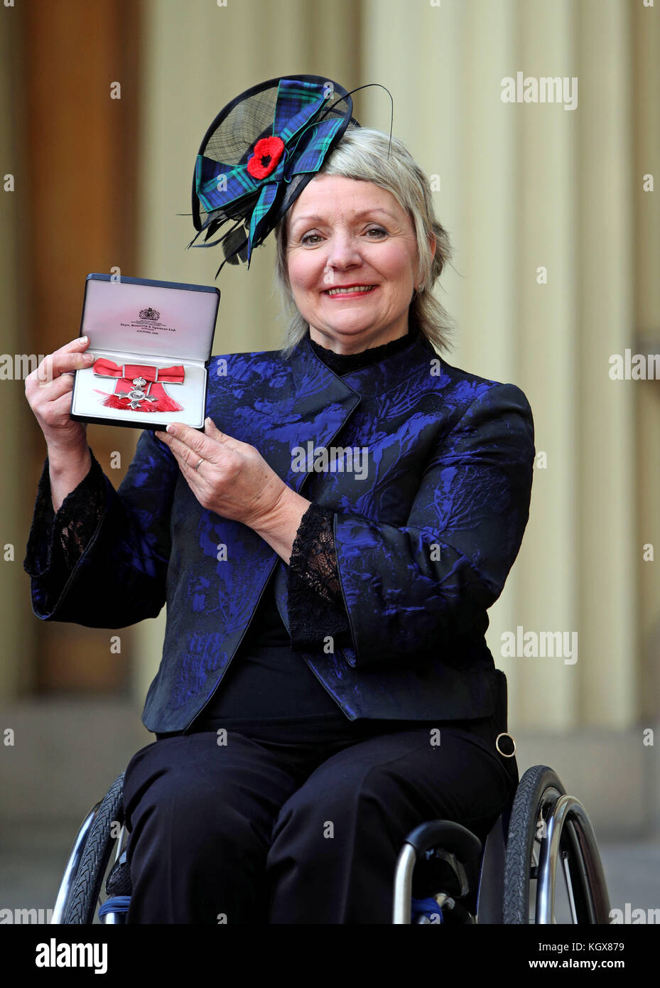 Angela Malone after she was awarded an MBE by the Duke of Cambridge at an Investiture ceremony at Buckingham Palace, London. Stock Photo