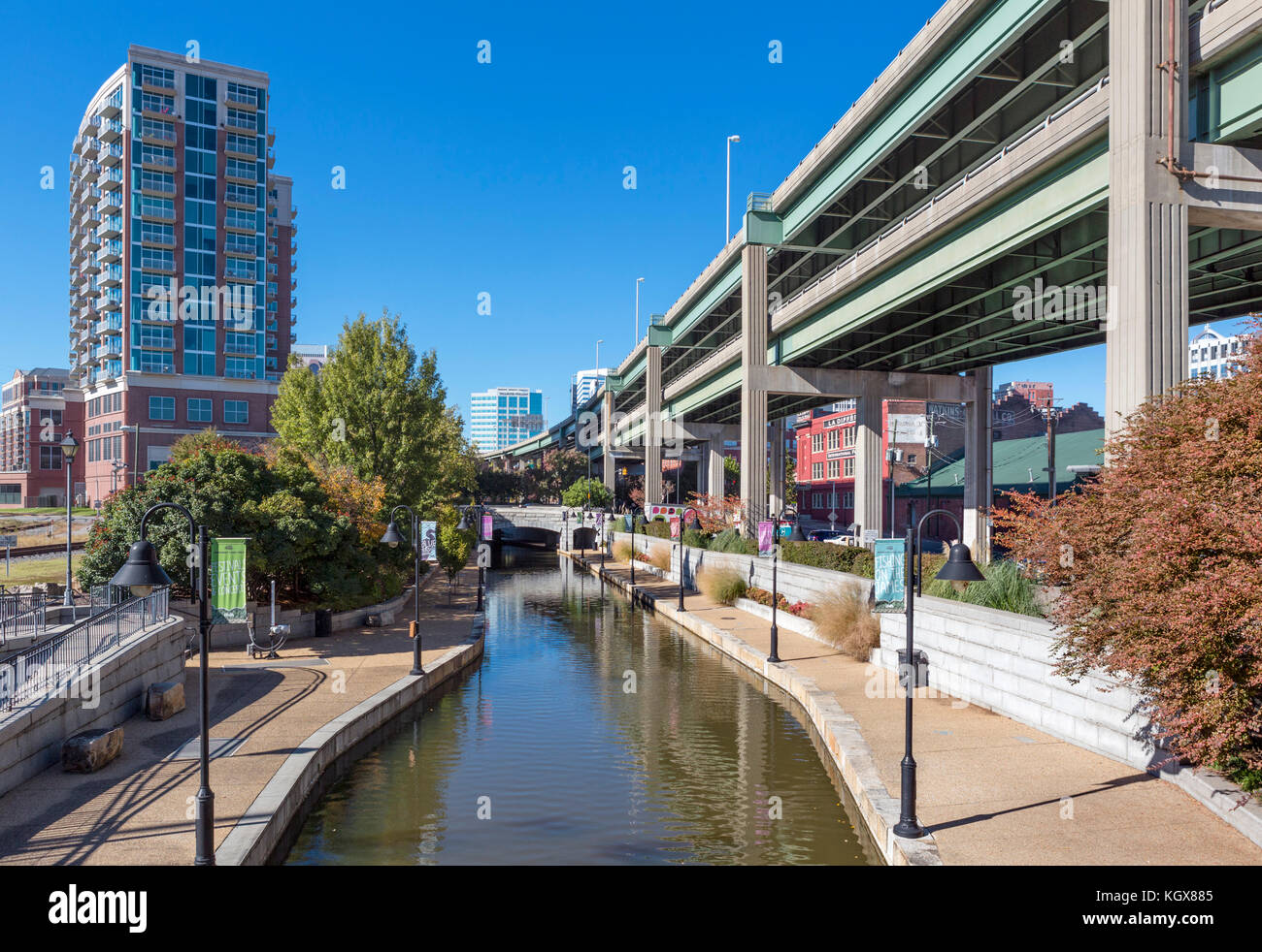 Canal Walk along Richmond City Canal with Expressway overpass to the right, Richmond, Virginia, USA. Stock Photo