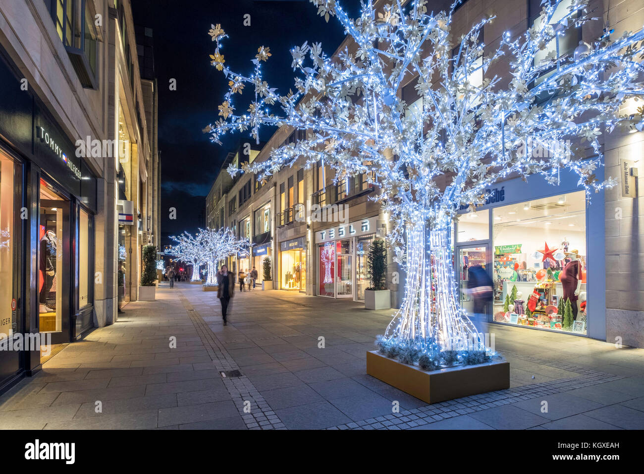 Night view of Multrees Walk upmarket shopping street with Christmas lights in off St Andrews Square in Edinburgh , Scotland, United Kingdom. Stock Photo