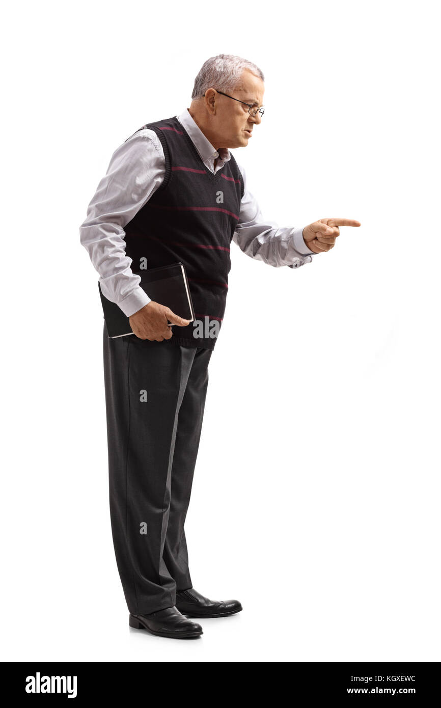Full length profile shot of a teacher scolding someone isolated on white background Stock Photo
