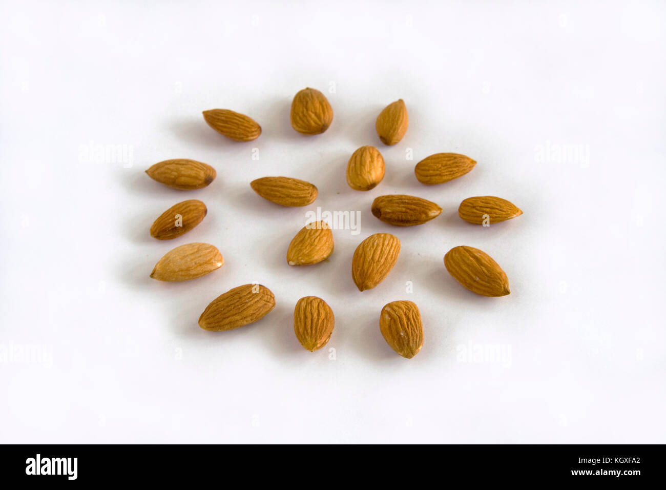 Almonds are nutritious nuts known to reduce bad cholesterol Stock Photo