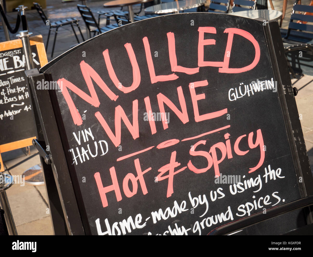 A sign advertising the sale of mulled wine outside an off licence in Cambridge UK Stock Photo
