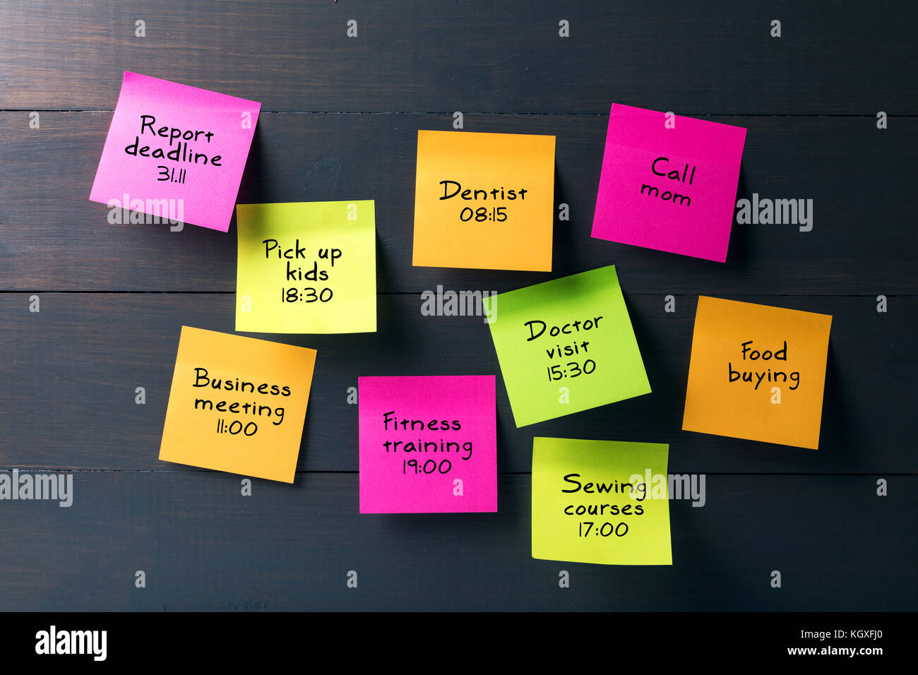 colorful sticky notes with busy woman schedule Stock Photo