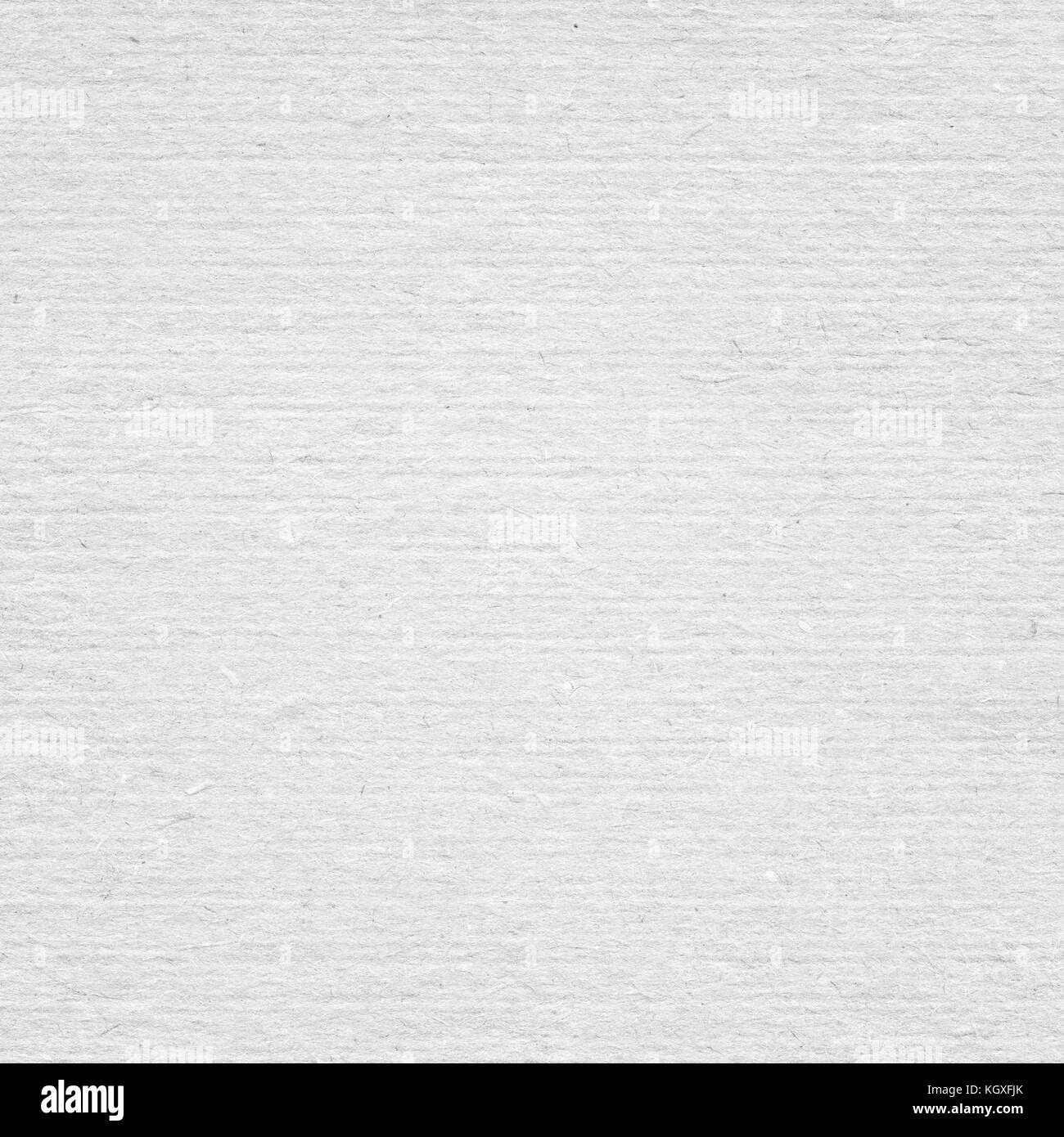 White recycled vertical note paper texture, light background. Stock Photo