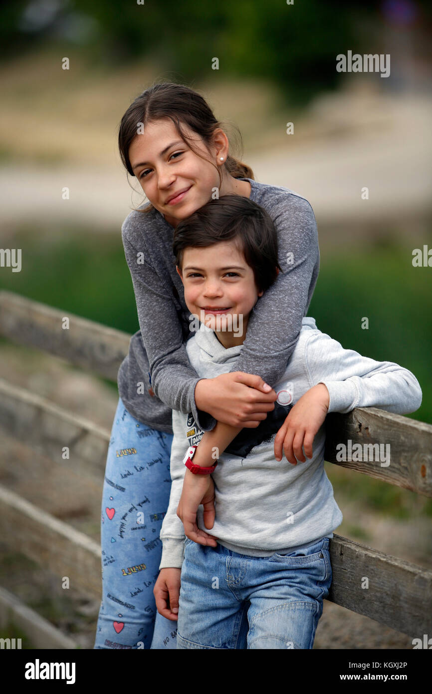 Boy giving hug hi-res stock photography and images - Alamy