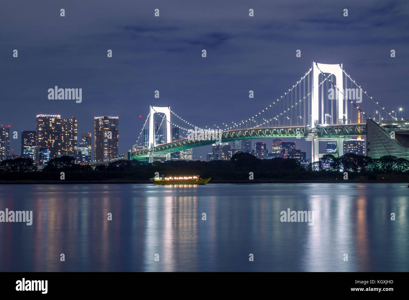 Tokyo skyline on the bay with Rainbow Bridge Stock Photo