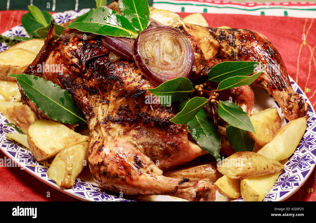 A Roast chicken with roast potatoes Stock Photo Alamy