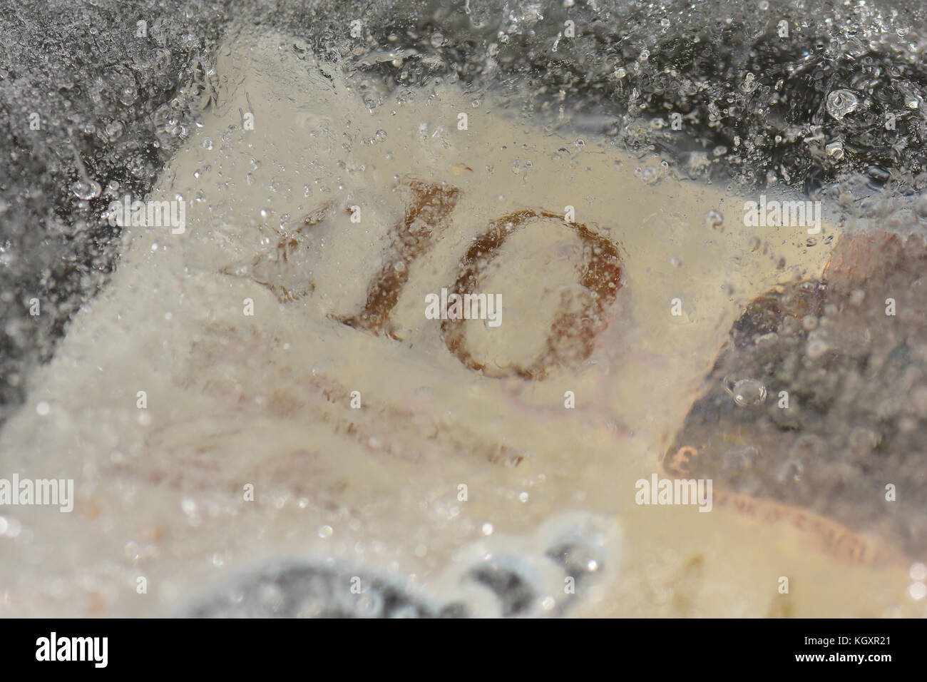 New £10 note frozen in ice Stock Photo - Alamy