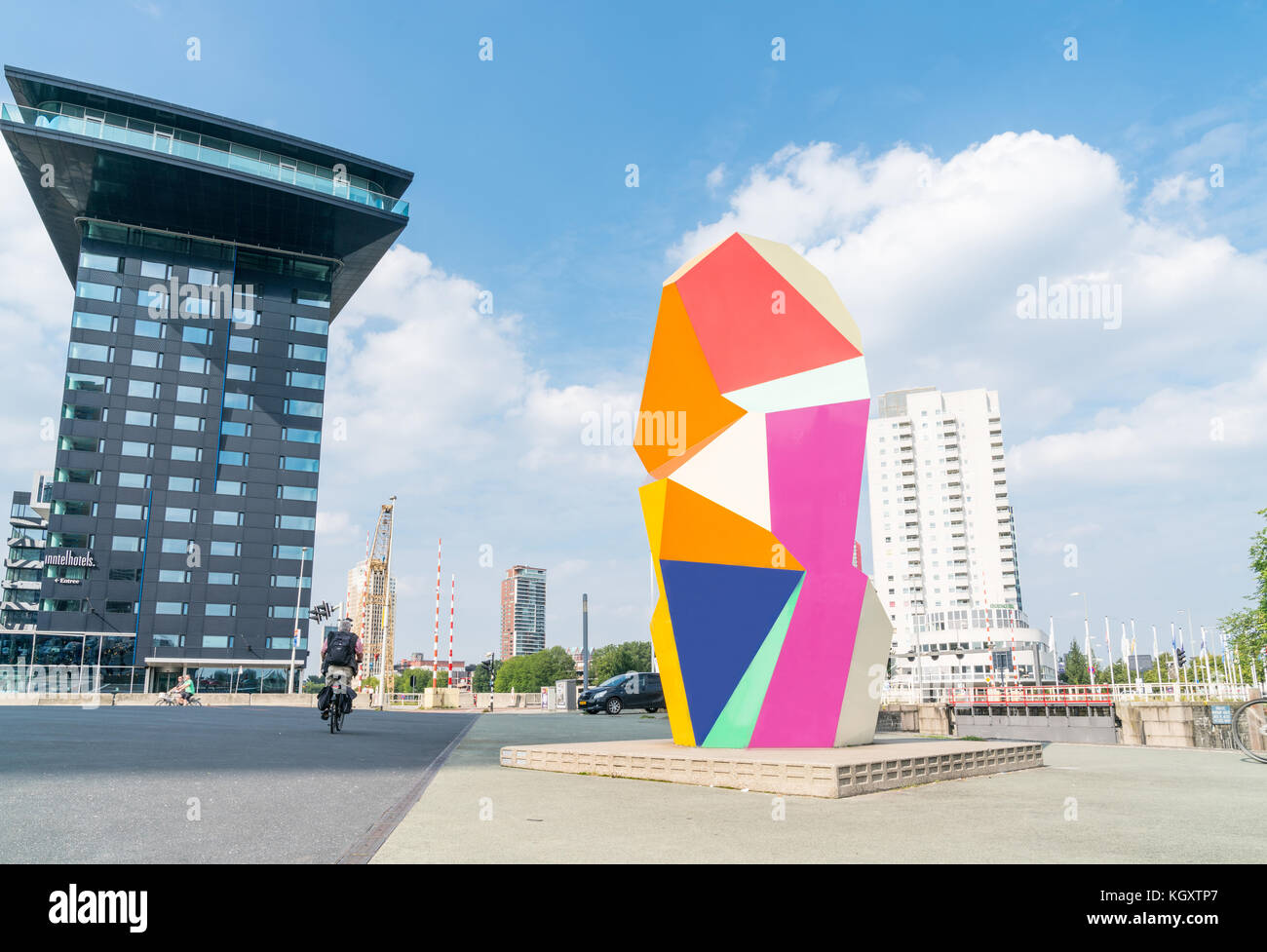 ROTTERDAM, HOLLAND -AUGUST 23, 2017; Multi-colored sculpture cubic sculpture, Marathon Image,  in Erasmuburg district with city's stunning modern arch Stock Photo